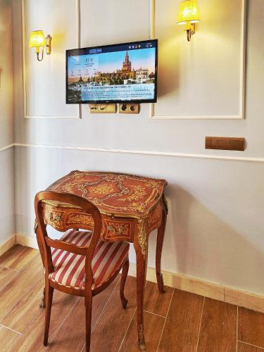 Μια τηλεόραση ή/και κέντρο ψυχαγωγίας στο SUITES SAN ESTEBAN 16 Real