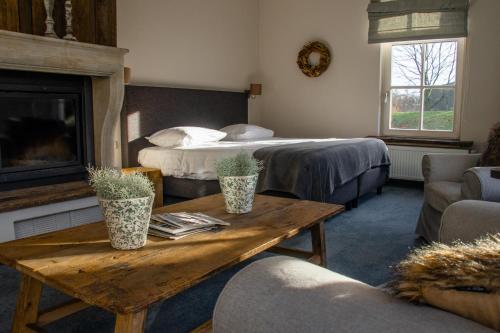 Posezení v ubytování Landhuis Hotel de Hilkensberg