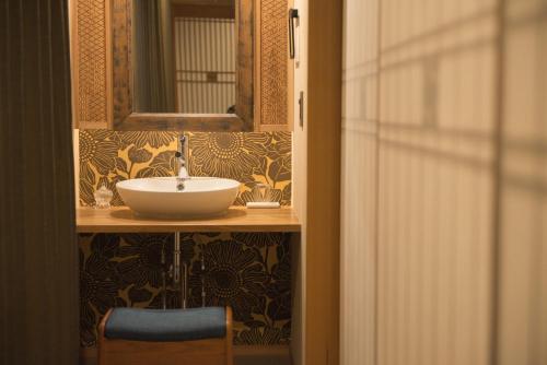 a bathroom with a sink and a mirror at Izumo - House - Vacation STAY 13870v in Izumo
