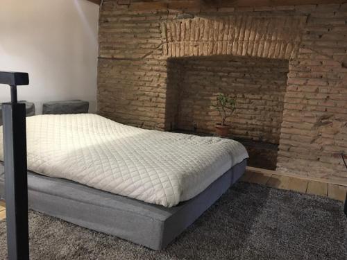 Кровать или кровати в номере Home in the Old City Center, Presidential Area
