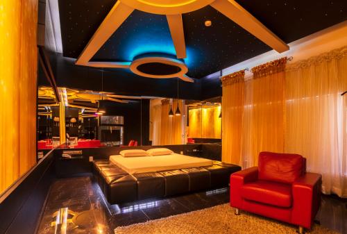 Postel nebo postele na pokoji v ubytování Gran Motel Dubai