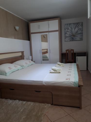 Postel nebo postele na pokoji v ubytování Apartman MAJA