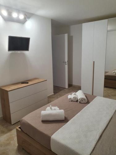 Postel nebo postele na pokoji v ubytování Dancing Apartment