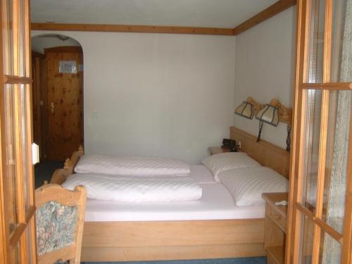 Ένα ή περισσότερα κρεβάτια σε δωμάτιο στο Hotel B&B Casa La Val