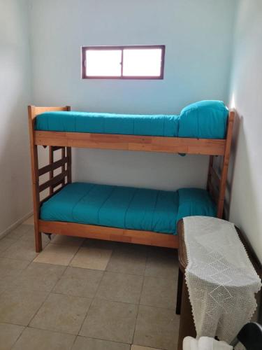 Hostal Viña Malvaにあるベッド