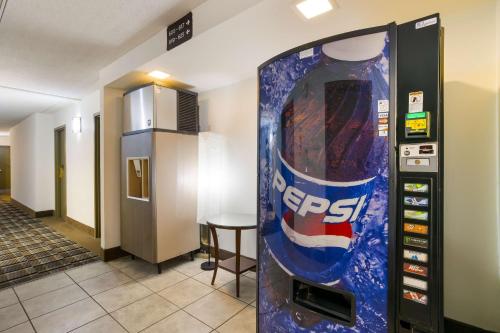 a vending machine with a pepsi cola cooler at Best Western Riverfront Inn in Marinette
