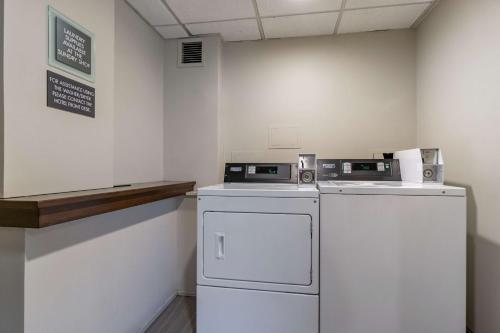 a laundry room with a washer and dryer at Best Western Plus Bellingham in Bellingham