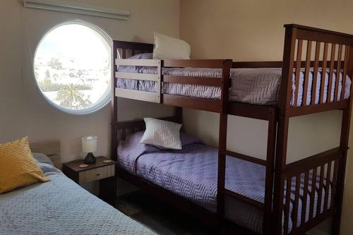 Postel nebo postele na pokoji v ubytování Hermoso apartamento a pasos de la playa