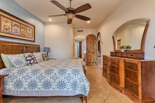 a bedroom with a bed and a ceiling fan at Bella Sirena Luxury Condo 205-B in Puerto Peñasco