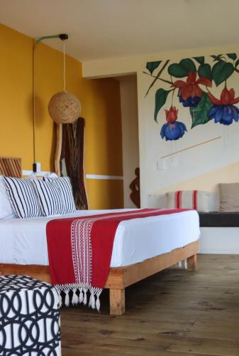 Postel nebo postele na pokoji v ubytování Selina Puerto Escondido