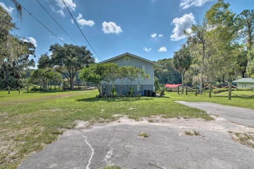 a house on the side of a road at Docks and Balcony Peaceful River Abode in Dunnellon in Dunnellon