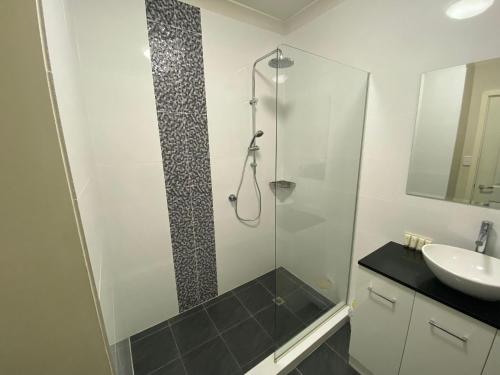 a bathroom with a shower and a sink at Unit 29 Seafront Estate in Jurien Bay
