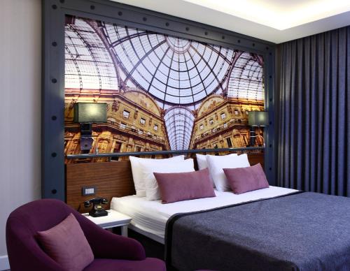 Tempat tidur dalam kamar di Montania Special Class Hotel