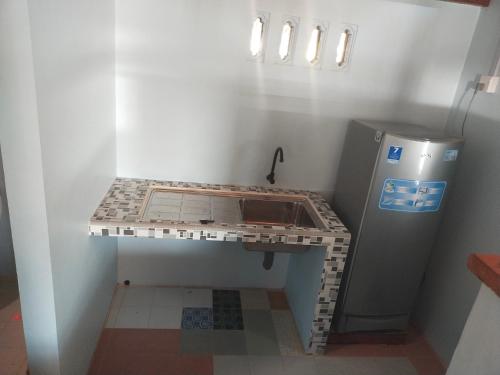 Kuchyň nebo kuchyňský kout v ubytování Homestay Pak Ucu
