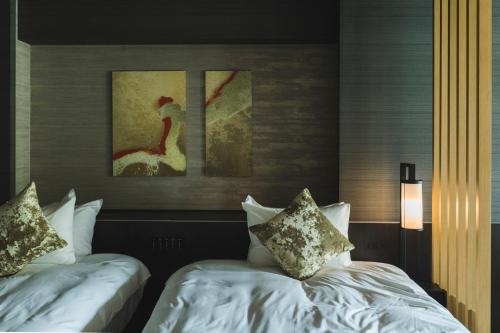 Una cama o camas en una habitación de Hakone Gora KARAKU