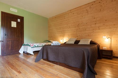 Una cama o camas en una habitación de Agriturismo Paradiso41