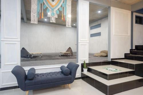 Zona de estar de Urbanview Hotel Umbrella Dieng by RedDoorz
