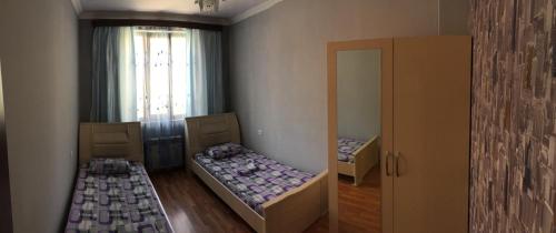 Postel nebo postele na pokoji v ubytování Arm Hostel