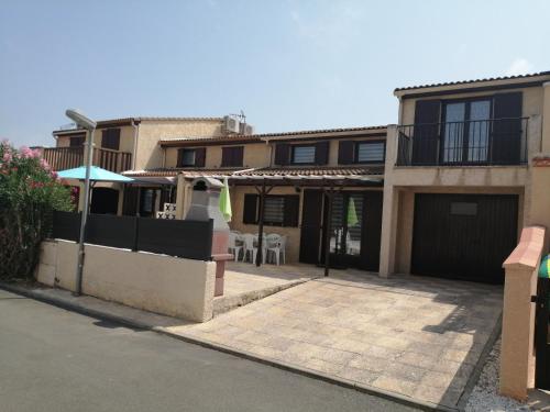 Agréable Maison, DOMAINE TAMARIS, 4 pièces 5 couchages, Wifi, séjour climatisé, Accès payant pour les piscines- PORTIRAGNES PLAGE LRTAMJ21