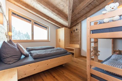 Una cama o camas en una habitación de Moarhof