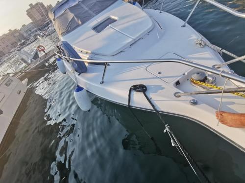 a boat is tied up in the water at albatiara rent boat in Siracusa