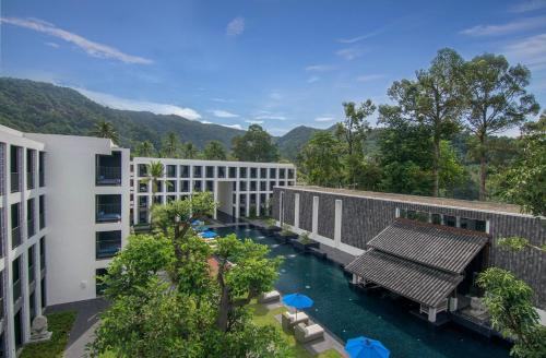an external view of a building with a pool of water at Awa Resort Koh Chang in Ko Chang