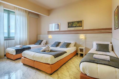 Ένα ή περισσότερα κρεβάτια σε δωμάτιο στο Hotel Castello