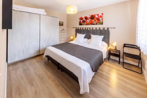 Posteľ alebo postele v izbe v ubytovaní La Fermette
