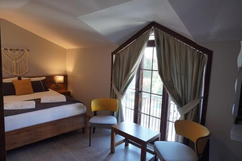 Una cama o camas en una habitación de Room 23 Hotel