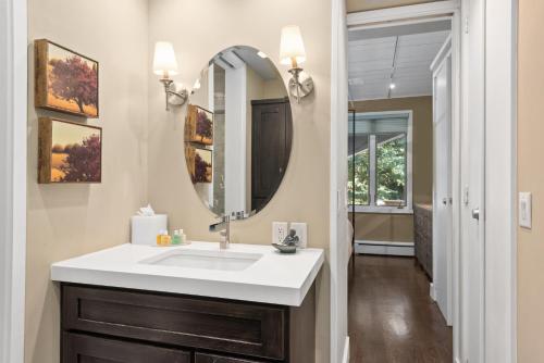 a bathroom with a sink and a mirror at Standard 2 Bedroom - Aspen Alps #110 in Aspen