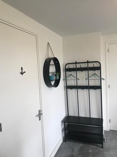 Katil atau katil-katil dalam bilik di Bed no breakfast de Kapitein