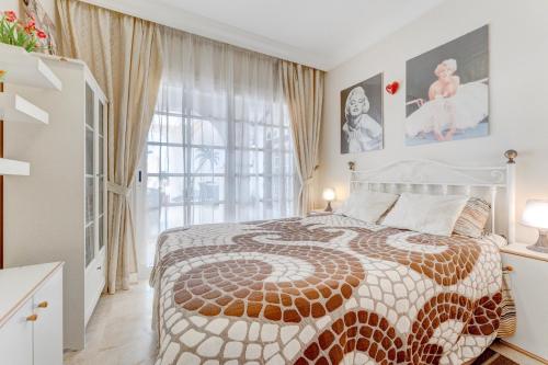A bed or beds in a room at Beautiful apartment in Terrazas del Duque I