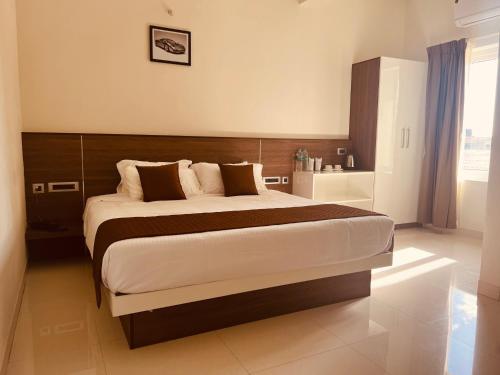 Una cama o camas en una habitación de Nandha Grande