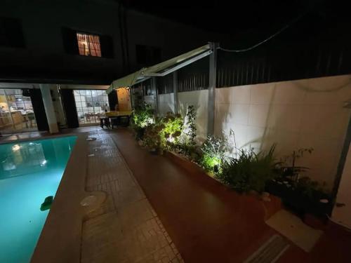 Bazén v ubytování Casa das Flores nebo v jeho okolí