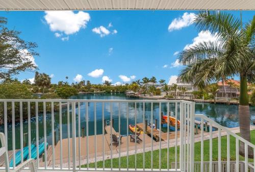 a view of the water from the balcony of a resort at Coconut Bayou home in Anna Maria