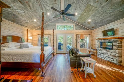 a bedroom with a bed and a ceiling fan at Starlight Haven Hot Springs in Hot Springs