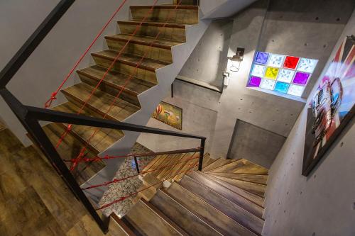 an overhead view of a staircase in a building at Yi Suo Yen Yu Homestay in Chenggong