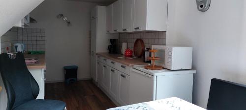 Η κουζίνα ή μικρή κουζίνα στο FERIENHAUS EICK