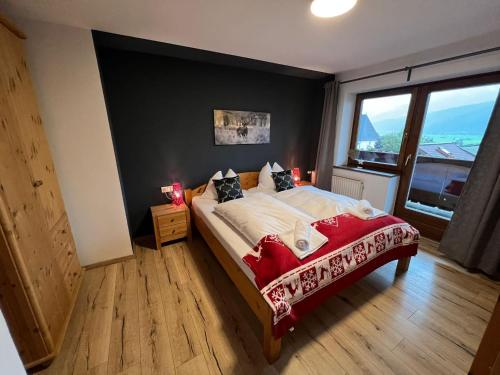 Ένα ή περισσότερα κρεβάτια σε δωμάτιο στο Apartments Chalet Sonnentanz