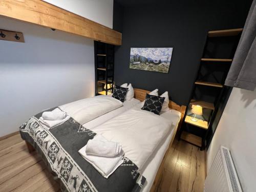 Ένα ή περισσότερα κρεβάτια σε δωμάτιο στο Apartments Chalet Sonnentanz