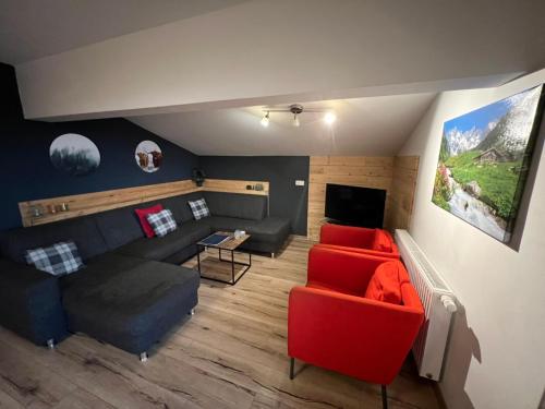 Μια τηλεόραση ή/και κέντρο ψυχαγωγίας στο Apartments Chalet Sonnentanz