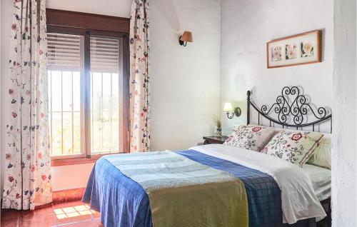 Postel nebo postele na pokoji v ubytování 1 Bedroom Amazing Home In Estepa