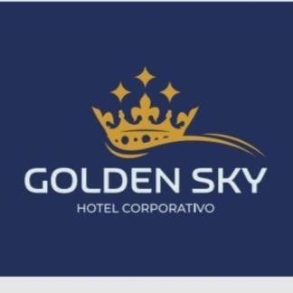 a gold sign with a crown on a blue background at GOLDEN SKY in Talara