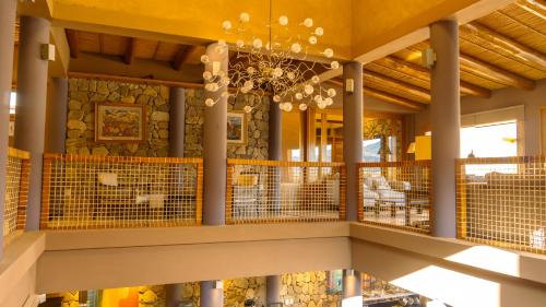 a lobby of a house with a chandelier at Las Marías Hotel Boutique in Tilcara