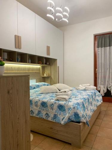Postel nebo postele na pokoji v ubytování villetta giulia fronte mare