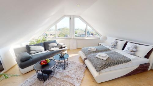 Posezení v ubytování Lieblingsplatz Neusiedl Appartement - Erhol dich gut