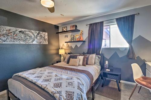 a bedroom with a bed and a window at 4 Mi to Beach Lake Havasu Apartment with Pool! in Lake Havasu City