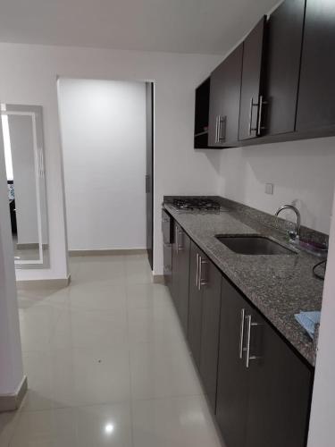 Dapur atau dapur kecil di Balcones de la Rivera Apartamento Azulejo 3