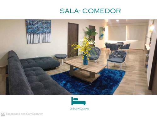 a living room with a couch and a table at TROPICAL OCEAN SAI in San Andrés