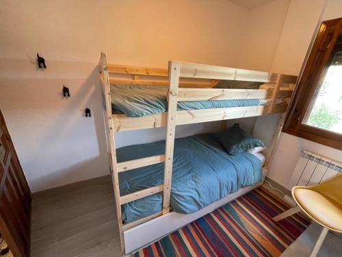 Bunk bed o mga bunk bed sa kuwarto sa Persistencia de la Memoria